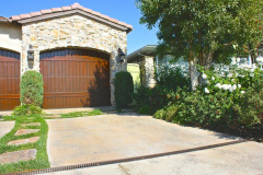 Simple Driveway with an organic look and friendly green approach — in Newport Beach, CA.