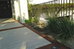 Existing fence with new hardscape.